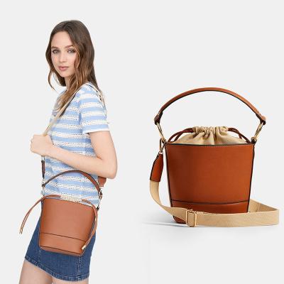 China Round Bucket Bag With Round Shaped Women Custom Black Vegan PU Leather Cross - Body Drawstring Lady Bags Bucket Handbag for sale