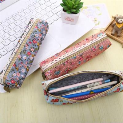 China Concise Cylindrical With Floral Design Cute Multifunctiona School Pencil Case Pen Bag for sale