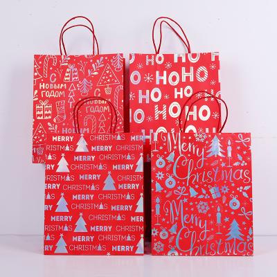 China 32*26cm Recyclable Medium Size Christmas Gifts Bags Party Gift Decorations Festival Paper Bags Store Market Packing Bag Customized for sale