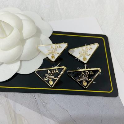 China Other 2021 Fashion New Arrival 925 Fashion Silver Letter Wild Luxury Metal Inverted Triangle Stud Earrings Women For Women for sale