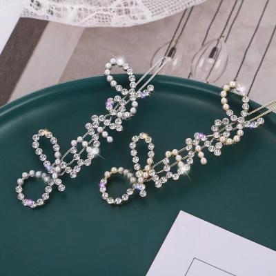 China 2021 European and American style new small perfume pearl rhinestone frog clip hits hair clip for women hair accessary girls for sale