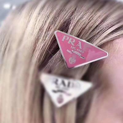 China New small and American style incense triangle P home letter hair clip stainless steel European wind inverted alloy hairpin for sale