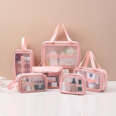 China Custom Cosmetics Convenience Clear Logo Travel Transparent Vinyl Waterproof Beach Zipper Bag TPU PVC Toiletry Wash Bag Custom With Handle for sale