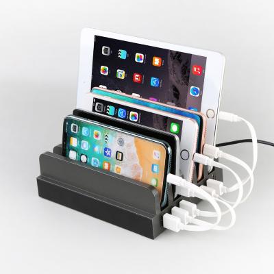 中国 6 port 2.4A charging station public cell phone battery USB charger for tablets iPad with 5pcs phone holders 販売のため