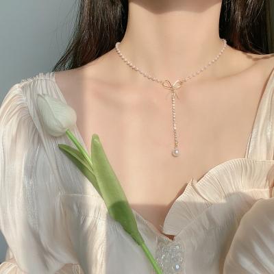 China New High Quality VKME Tasty Baroque Gold Plated Link Chains Bead Bowknot Crystal Charm Pendant Pearl Necklaces Necklaces for sale