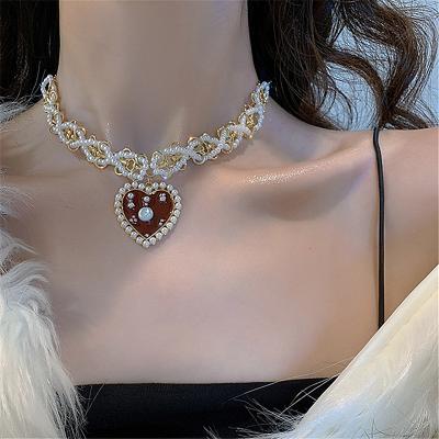 China XINYAO High Quality Vintage Style Red Heart Necklace For Gifts Elegant Gold Kolye Jewelry Party Women Girls Pearl Necklace Chain Necklaces for sale