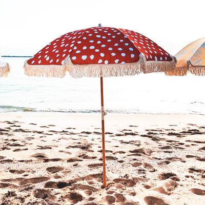 China CLASSIC High Quality Outdoor Umbrellas with Tilt and Fringe Custom Design Beech Wood Tassel Printed Beach Umbrella for sale