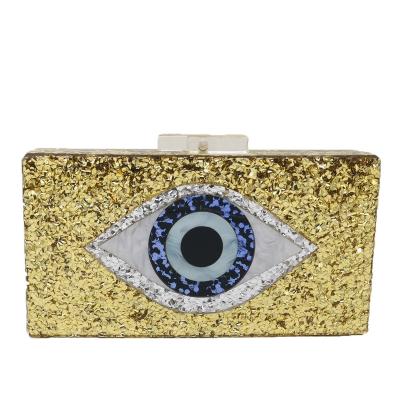 China Hot Sale Celebrity Evil Eye Banquet Bag Acrylic Devil's Eye Clutch Women's Bag Hip Hop Fashion Bling Handbag for sale