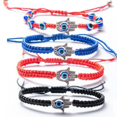 China Wholesale Cheap Ethnic Evil Fatima Hand Amulet Braided Friendship Bracelet Hamsa Woven Turkish Evil Eye Bracelet For Man And Women Gift for sale