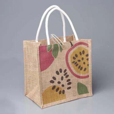 China 100% New Fashion Jute Printing Tote Bag Hemp Graffiti Bag Eco-Friendly Fashionable Casual Burlap Small Bags For Women Girls for sale