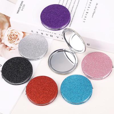 China Round 72mm Large Folding Flip Bling Hand Mirror Metal Leather Glitter Portable Pocket Double Sided Portable Makeup Mirror for sale