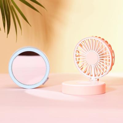 China Newest Custom Beauty Tool Mini Handheld Cake Creative Portable Rechargeable Fan With Mirror for sale