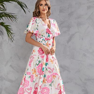 China New Anti-wrinkle Style Bohemian Dress Floral Print Slim Elegant Casual Short Sleeve Irregular Ruffle Maxi Dress Ladies for sale