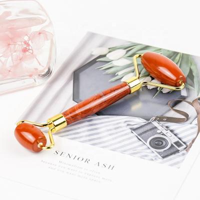 China Ocean Whitening Facial Jasper Jade Red Jasper Skin Roller Rodillo Massage Stones Quartz Roller With Jade Roller Packaging for sale