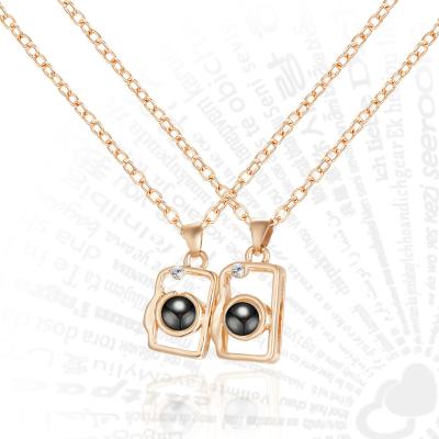 China FASHIONABLE I Love You Magnetic Camera Projection 100 Languages ​​Lovers Splicing Necklace For Couples for sale