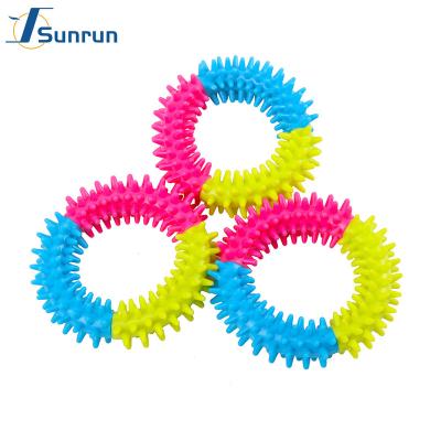 China Sustainable Pet Ring Teeth Cleaning Bite Resistant Natural Rubber Three-Color Spike Ring Pet Toys for sale