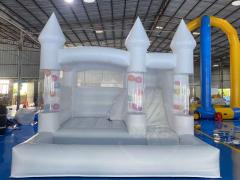 white bounce house with slide