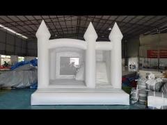 white bounce house with slide