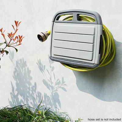 China WALL USE MOUNTABLE Plastic Garden Lawn Hose Hanger Wall Mounted Home Storage Container for sale