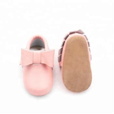 China Wholesale Cute Pink PU Baby Shoes Baby Moccasins Bow Design Genuine Leather Baby Moccasins for sale