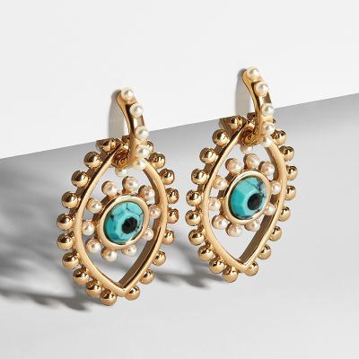 China TRENDY fashion jewelry earrings personality exaggerated devil's eye pearl turquoise women's earrings for sale