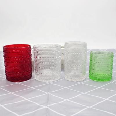 China FengJun luxury 250ml 300ml emboss empty clear red green glass tumbler candle jars sublimation for candle making with lids wholesale for sale