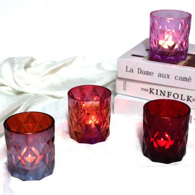 China FengJun Luxury free sample luxury classic embossed color customize bulk high quality glass candle holders wholesale 10oz manufacturing for sale