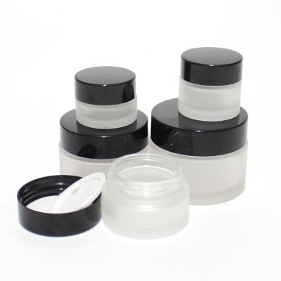 China Fengjun Cosmetic Wholesale Cosmetics Packaging Free Samples With Black Plastic5ml 10ml 15ml 30ml 50ml 100ml Jar Body Butter Jars for sale