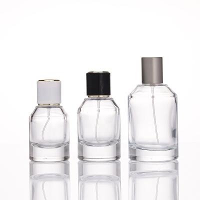 China FengJun 30ml 50ml 100ml Luxury Recyclable Decorative Clear Round Glass Perfume Bottle With Pump Spray Cap for sale