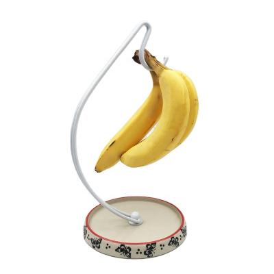 China Modern Handmade Ceramic Banana Rack Holder For Kitchen Fruit Shelf Dish Hanger for sale