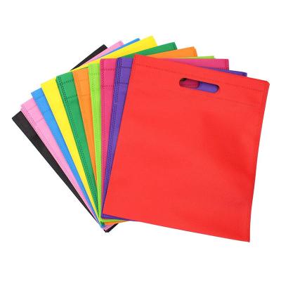 China Handled Logo 10 Color Rainbow Party Favor Bag Custom Hand D Cut Nonwoven Sack Bag For Party Suitable Gifts for sale