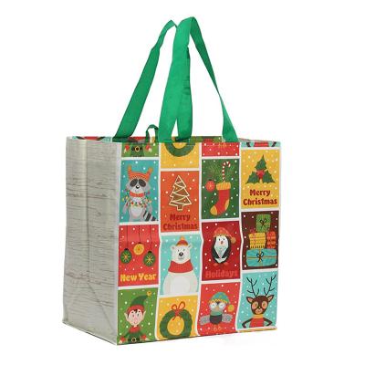 China Reusable Snowflake Pattern Green Nonwoven Folding Gift Bag Green PP Christmas Nonwoven Bag Large With Handle for sale