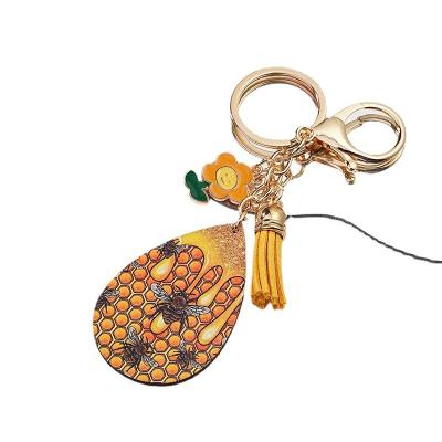 China Durable New Honeycomb Key Creative Fashion Horse Honeycomb Car Bag Tassel key chain accessories for sale