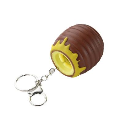 China Durable Hot selling new honey can bear squeezing cup pinch music key chains for girls for sale