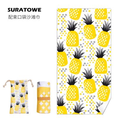 China Compressed Custom Pattern Sand Proof Microfiber Quick Dry Beach Towel Larger For Vacation With Drawstring Bag for sale