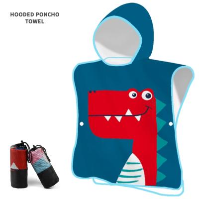 China Custom digital printed free portable hooded beach towel compressed suede microfiber cartoon dinosaur pattern quick dry sand poncho for kids for sale