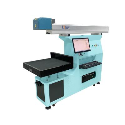 China Water Cooled CO2 Laser Cutter Fabric Cloth CO2 Laser Marking Machine Leather Engraving Machine for sale