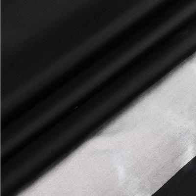 China Chinese supplier waterproof 100% polyester blackout fabric silver coated taffeta fabric for curtain for sale