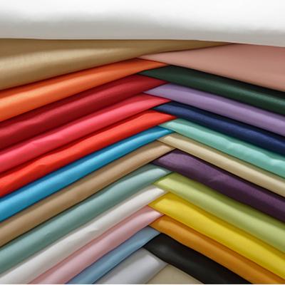 China Waterproof Polyester Pongee Fabric 75D*75D 75D*150D 50D*50D Full-matte Semi-matte Jacquard Pongee Fabric For Liner Jacket Coat for sale