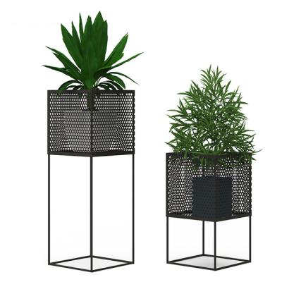 China Nordic Creative Balcony Flower Rack Pattern Wrought Iron Living Room Shelf Eco-Freindly Potted Flower Rack for sale