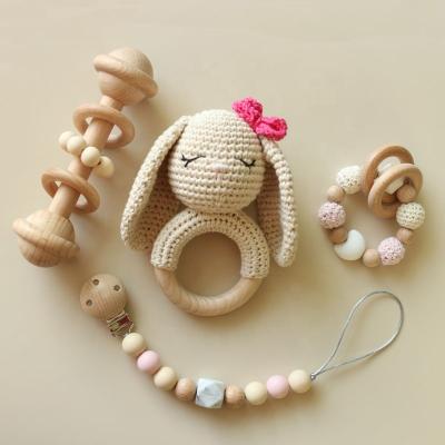 China Toy Natural Baby Beech Wood Soft Crocheted Bunny Rattle Teething Toys Teething Bracelets Set Baby Wooden Teethers Easter Gift Set for sale