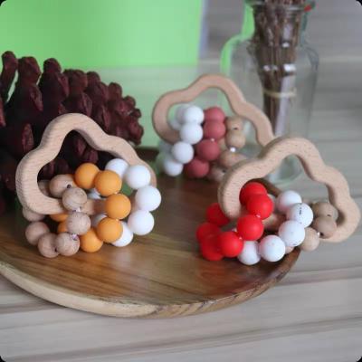 China Toy Custom Food Grade Soft Silicone Beads Wooden Teether Baby Teething Toys for sale