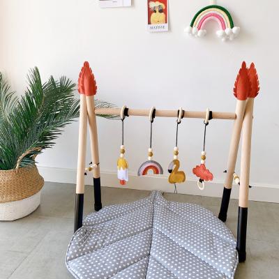 China Cartoon Toy Ins Wholesale Wood Baby Play Gym with Hanging Teething Toys for sale