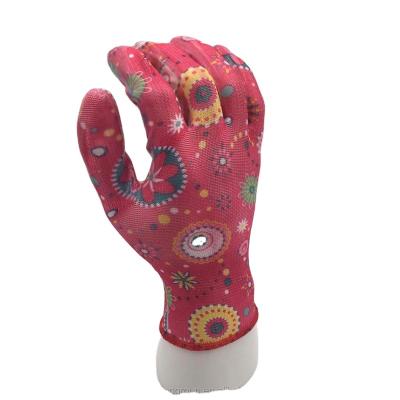 China 13 Gauge Anti-Slip Transparent Flower Printed Nitrile Coated Polyester Nylon Gloves for sale