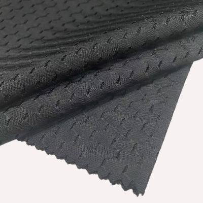 China Blackout Recycle Nylon Spandex 4 Way Hexagonal Elastane Eyelet Stretch Sports Mesh Fabric for sale