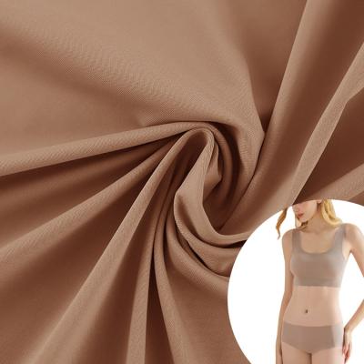 China Stretch Nylon Spandex Top Stretch Knitting Yoga Pants Underwear Shapewear Functional Knitting Fabric for sale