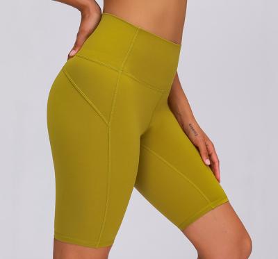 China New Solid Color Yoga Breathable Classic Naked Women Pants Elasticity Peach Buttocks Elasticity Abdomen Sports Shorts for sale