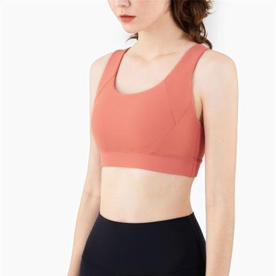 China Breathable Women Cross Straps Backless Sports Bra Tank Top Fitness Shockproof Crop Tops Vest for sale