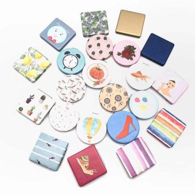 China Customized Design OEM Color Vegan PU Makeup Compact Pocket Enlarging Leather Mirror for sale