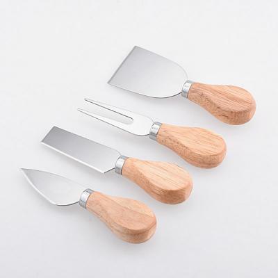 China Hot Viable Amazon Selling 4pcs Cheese Knife Tool Kit Unique Stainless Steel Cheese Knife Set With Wooden Handle for sale